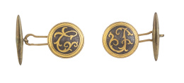 328.  Gemelos circulares de pp. S. XX con trabajo de damasquinado con iniciales "C" y "J"