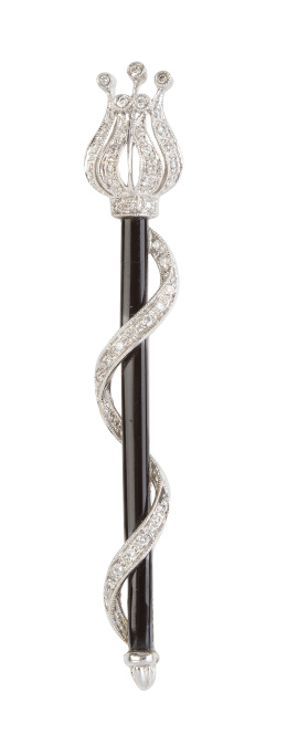343.  Broche barra de brillantes y ónix con diseño de cetro
