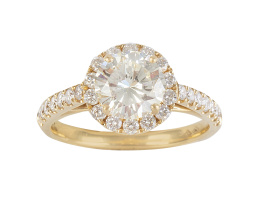 298.  Sortija con solitario de brillante central de 1,54 ct orlado de brillantes y con brillantes decorando los brazos de la montura
