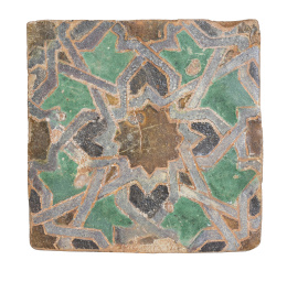 1151.  Azulejo de arista mudéjar, con decoración en negro, verde y ocre con decoración geométrica.h. 1500.