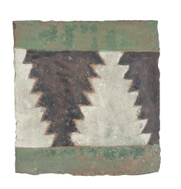 1152.  Azulejo de pared esmaltado en verde, negro y blanco con decoración de Colmenillas.S. XVI.