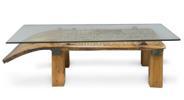 1309.  Trillo montado en mesa con patas de madera y tapa de cristal.S. XX.