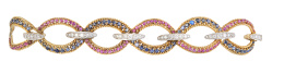 175.  Brazalete años 50 de rubíes, zafiros y brillantes con diseño de cadeneta