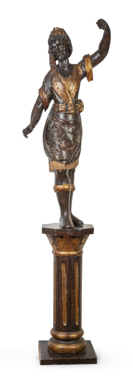 1183.  "Blackamoor" de madera tallada, policromada y dorada, con aplicaciones que simulan coral y perlas.Trabajo veneciano, ff. del S. XIX - pp. del S. XX.