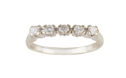 212.  Sortija cintillo de brillantes engastados en garras