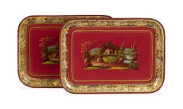 1226.  Pareja de bandejas de latón pintado de rojo con paisaje y flores pintadas y doradas en el perímetro.S. XIX.