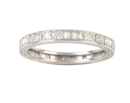 74.  Alianza completa de brillantes con lateral decorado con grabados de líneas vegetales