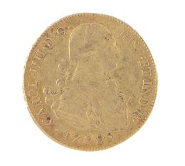 329.  Moneda de 8 escudos de Carlos IV. 1799 en oro. Bolivia. PP.