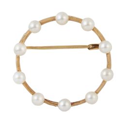 119.  Broche circular de perlas años 60