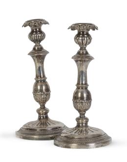 748.  Pareja de candeleros en plata española punzonada. Con marcas.Barña, Carreras, Barcelona, mediados del S. XIX.