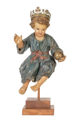 529.  "Niño Jesús como Salvador del Mundo".
Madera tallada, poli