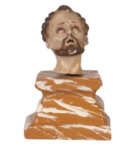 1250.  Cabeza de santo de madera tallada y policromada, con ojos de pasta vítrea.España, S. XVIII.