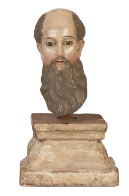 1252.  Cabeza de santo de madera tallada y policromada, con ojos de pasta vítrea.España, S. XVIII.