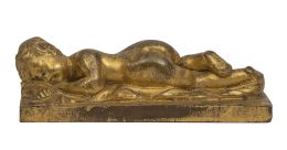 521.  Niño Jesús dormido.Escultura en bronce dorado.h. 1800.