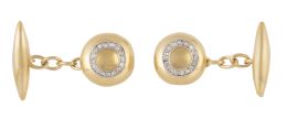 82.  Gemelos circulares de pp. S. XX con botón convexo decorado por círculo de diamantes