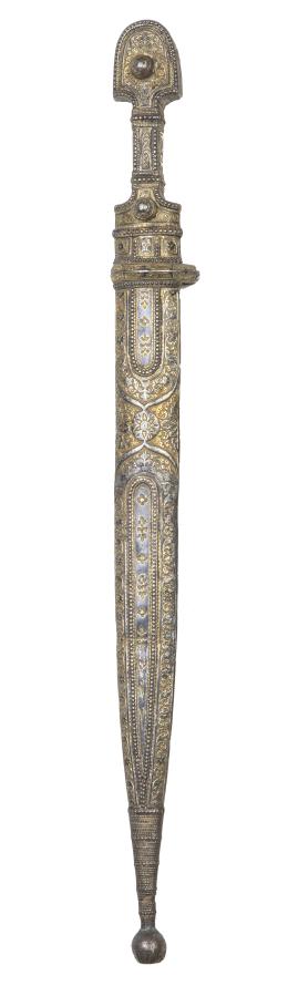 1123.  Kinjal de cosaco en plata nielada, decorada con flores.S. XIX.