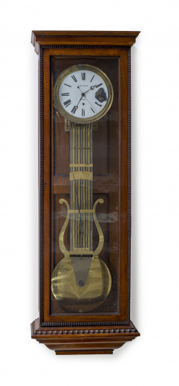 1094.  Reloj regulador de caja alta en madera de caoba.Firmado en la esfera: CARLOS CHAUVIN