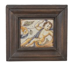 1181.  Azulejo de cerámica esmaltada con putti.Triana, S. XVIII.