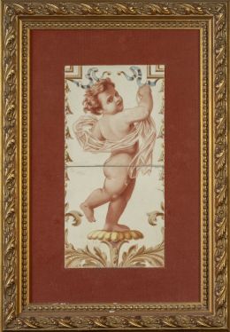 1189.  Dos azulejos de cerámica esmaltada con "putti".h. 1900.