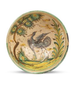 1014.  Cuenco de cerámica esmaltada con ave.Talavera-Puente del Arzobispo, S. XVIII.