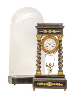 677.  Reloj de pórtico de madera tallada y ebonizada con bronce d