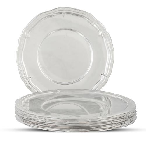 Juego de doce bajoplatos de metal plateado.Meneses, S. XX.