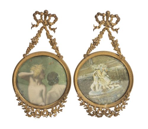 Pareja de marcos circulares de bronce dorado de estilo Luis