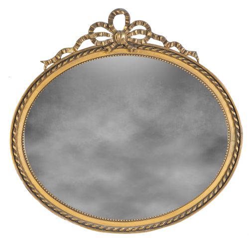 Espejo oval de madera tallada y dorada de estilo Luis XVI.