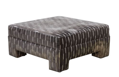 Puff moderno tapizado.