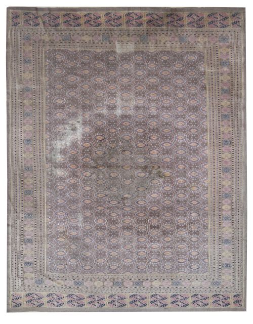 Alfombra en seda de campo beige y motivos geométricos.Per