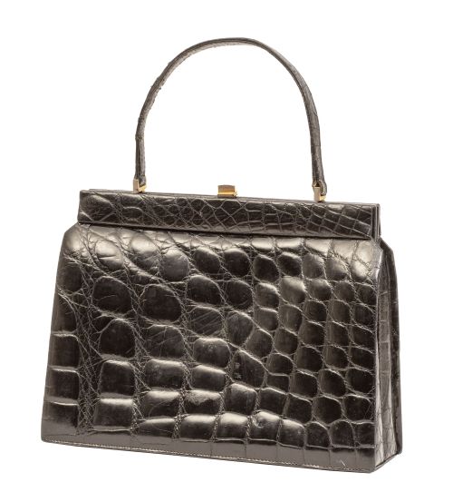 Bolso vintage de piel de cocodrilo negro con un asa