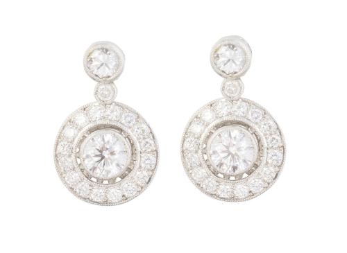 Pendientes ojo de perdiz de brillantes, con brillante centr