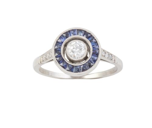 Sortija ojo de perdiz, con chatón de brillante central de 0