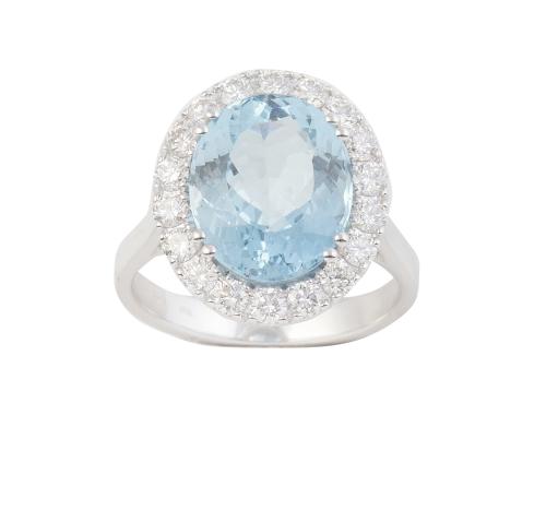 Sortija con aguamarina oval de 5 ct aprox orlado de brillan