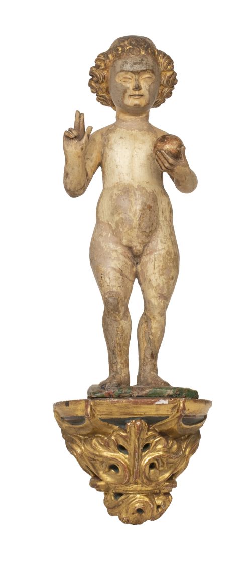 Niño Jesús.Escultura de madera tallada con restos de poli