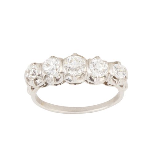 Sortija cintillo de brillantes engastados en garras de tama