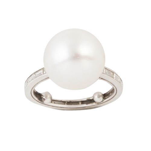 Sortija con perla australiana en alianza completa de brilla