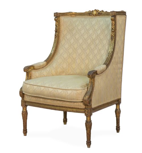 Butaca de estilo Luis XVI de madera tallada y dorada.h. 1