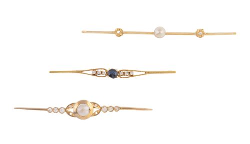 Conjunto de tres broches-alfiler de pp. S. XX en oro 