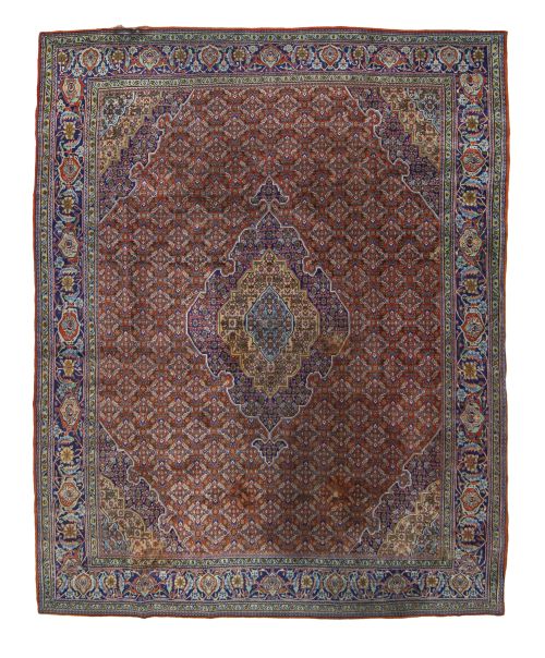 Alfombra kirman en lana de campo granate y azul.Persia.