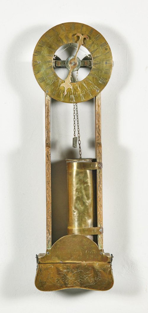 Reloj de agua en madera y metal grabadoInscrito “Robert Na
