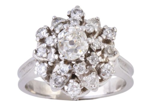 Sortija en forma de flor en oro 18K y brillantes, coronada 