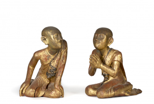 Pareja de modelos tailandeses de deidades en madera tallada