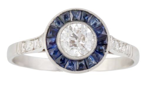 Sortija ojo de perdiz con brillante central de 0,48 ct, orl