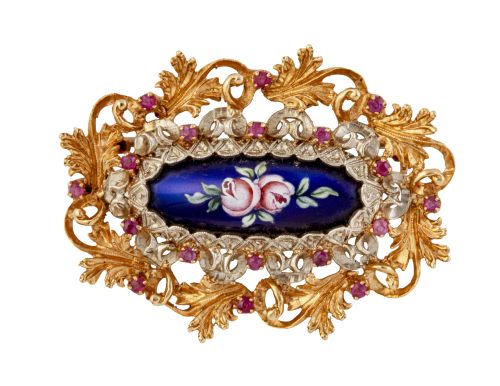 Broche ovalado con centro esmalte de flores, en marco de ho