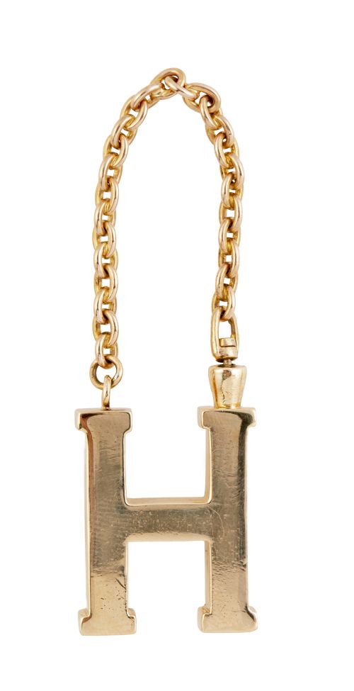 Llavero HERMÈS- PARÍS en forma de H realizado en oro