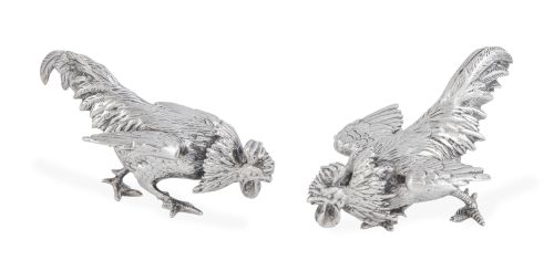 Pareja de gallos decorativos de metal plateado.S. XX.