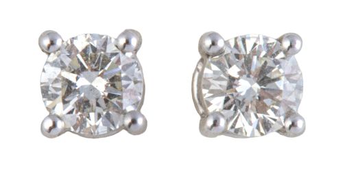 Pendientes dormilonas con diamante central de 0,60 ct. apro