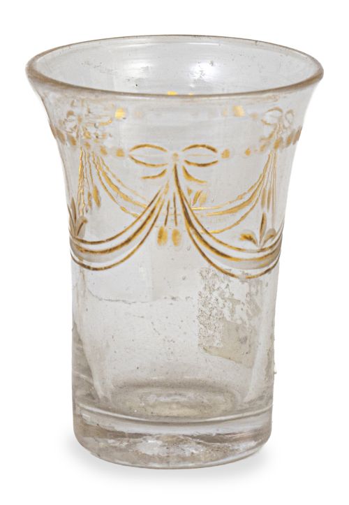Vaso en forma acampanada de vidrio transparente y dorado co