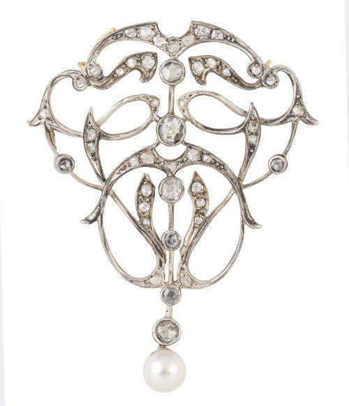 Broche Belle-Époque con diseño calado, cuajado de diamantes